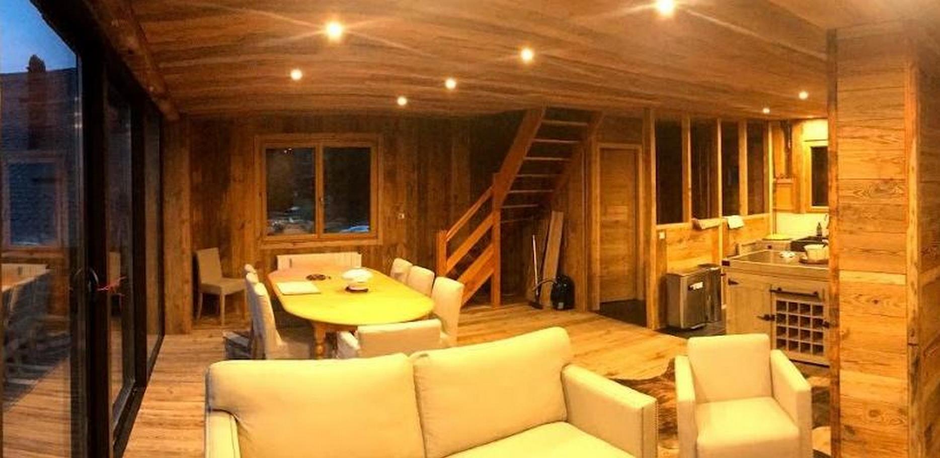 Super Besse Gite - living room of the chalet with beautiful view of the slopes of the Super Besse ski resort