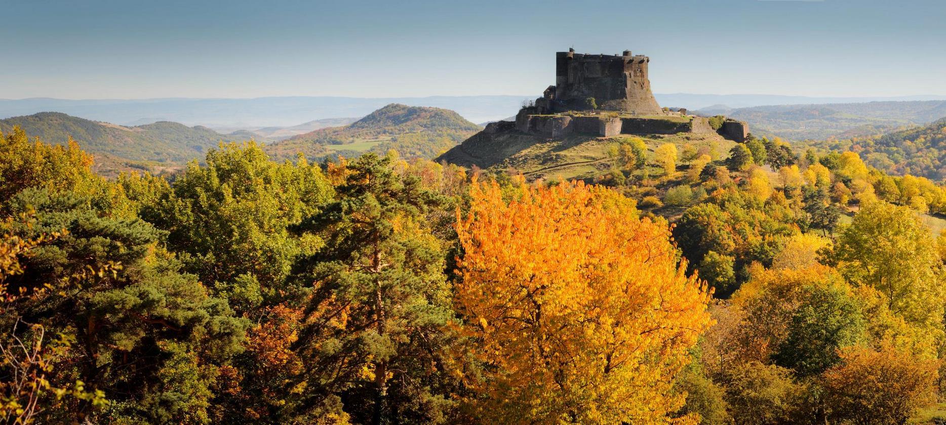 Chateau de Murol with a view of the Volcanoes of Auvergne
