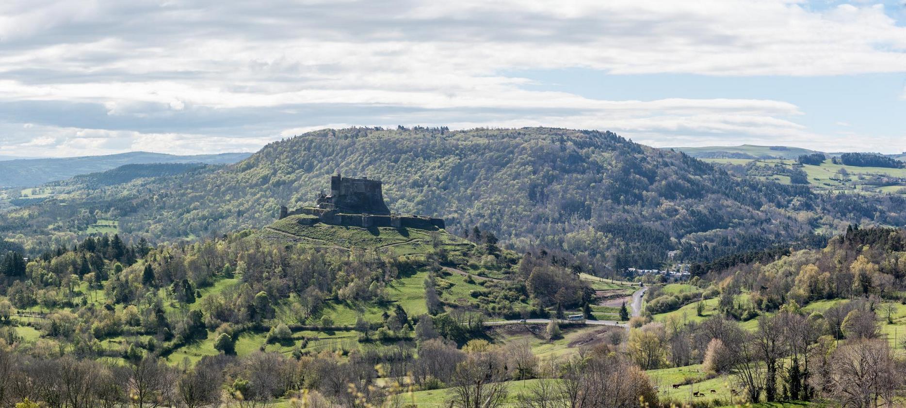 Panoramic of the castle of Murol, with a view of the Volcanoes of Auvergne