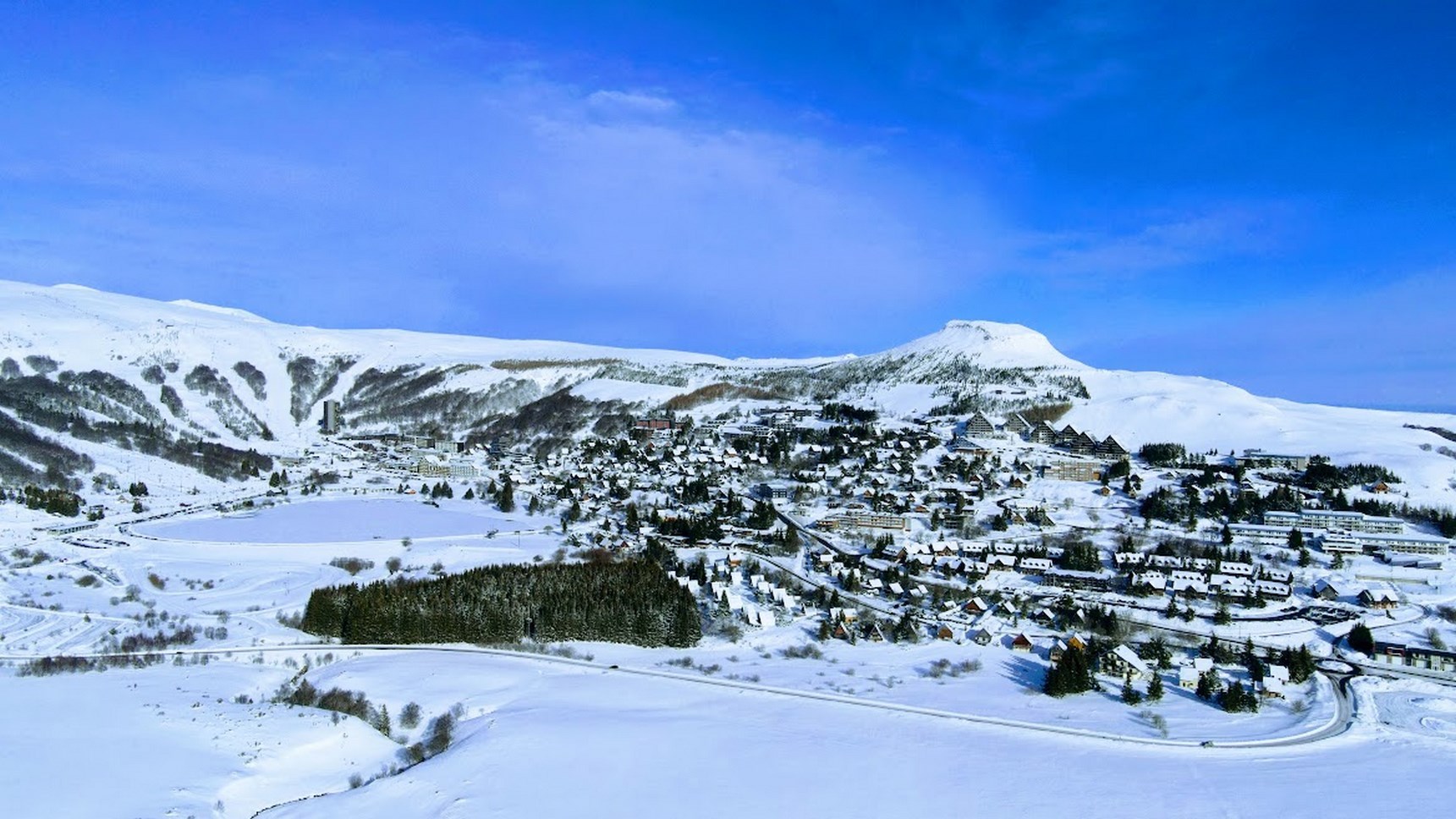 Wide panorama on the ski resort of Super Besse