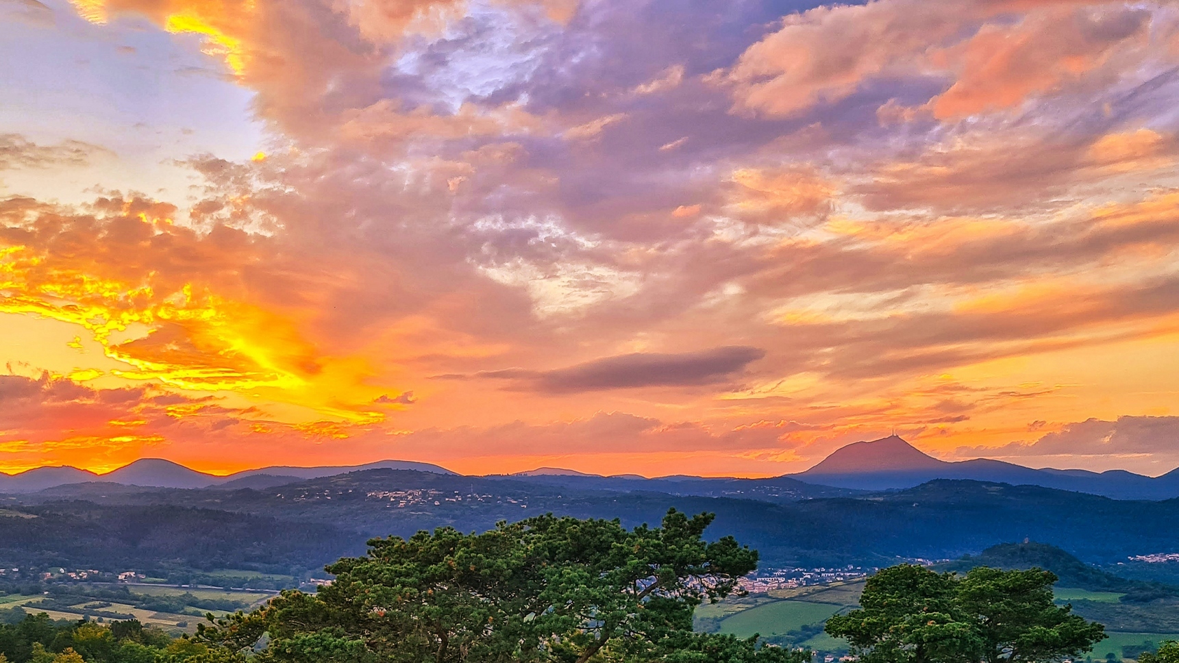 Chaine des Puys, sunset over the Chaine des Puys and the Puy de Dome