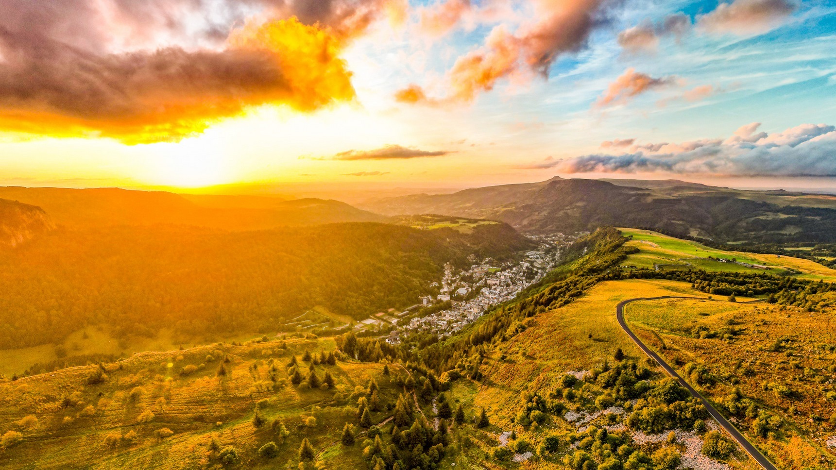 In the Sancy, sunset over the town of Mont Dore