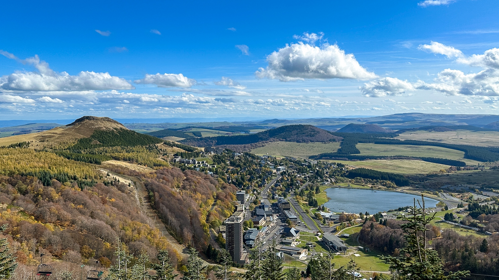Zipline in Super Besse, view of Super Besse in Autumn and the Puy du Chambourguet