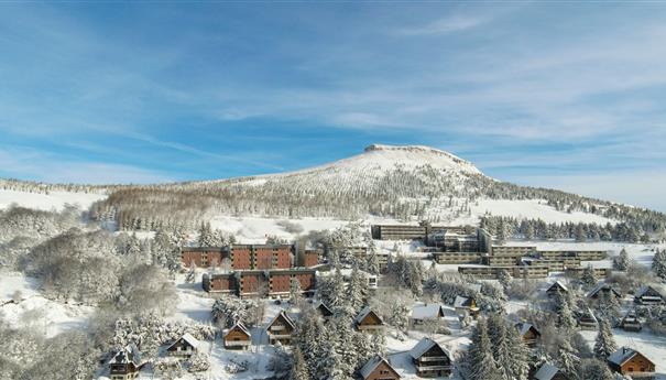 Super Besse seen from the sky, the VVF and the Belambra Holiday Village under the snow