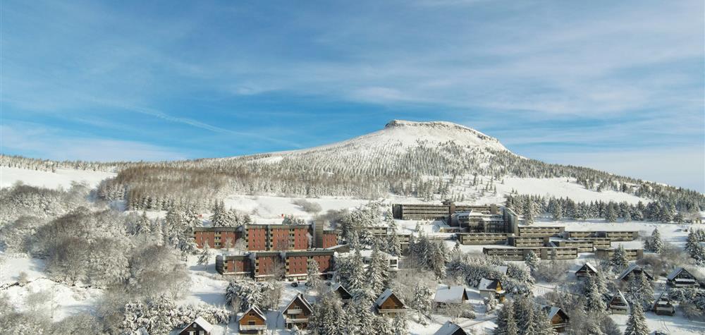 Super Besse seen from the sky, the VVF and the Belambra Holiday Village under the snow
