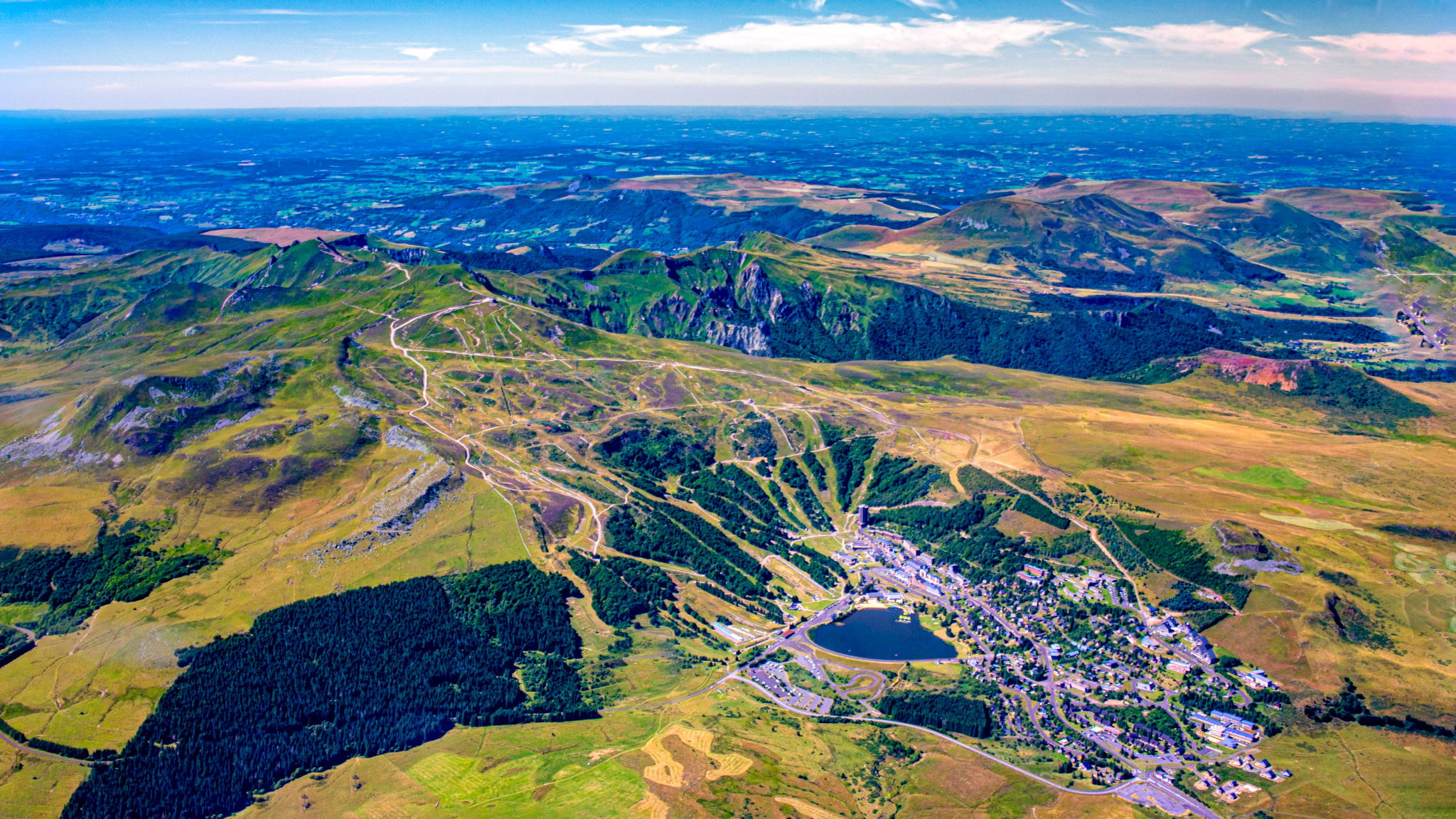 Aerial photo of the Massif du Sancy, From Super Besse to the Puy de Sancy, view of the Chaudefour Valley