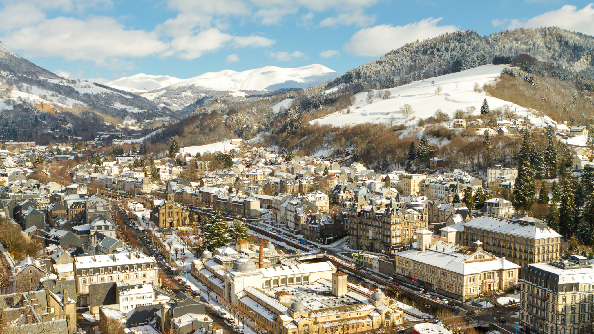 The snow-capped Monts Dore dominating the town of La Bourboule