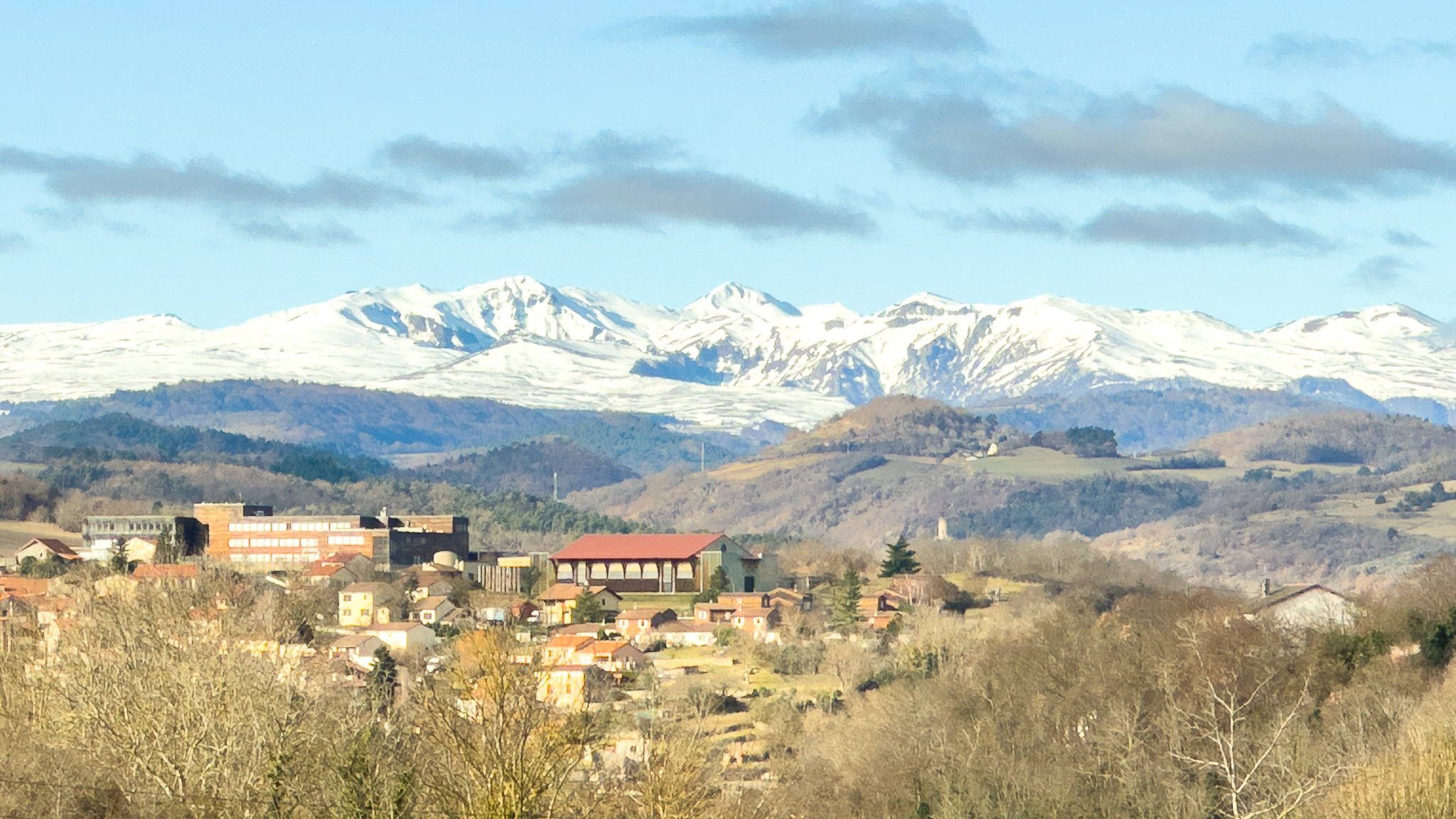 Above Champeix, magnificent view of Super Besse and the snow-capped Massif du Sancy
