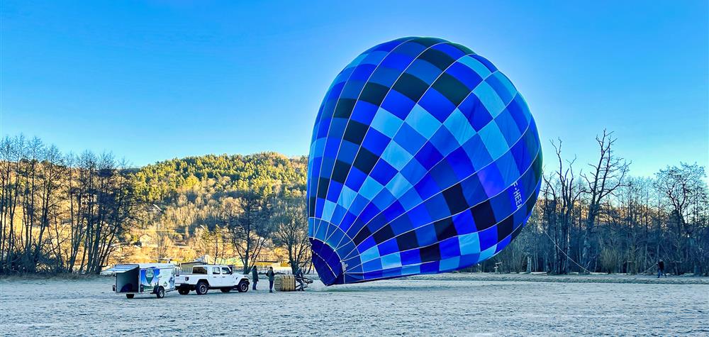 Hot air balloon over Lac Chambon, Murol