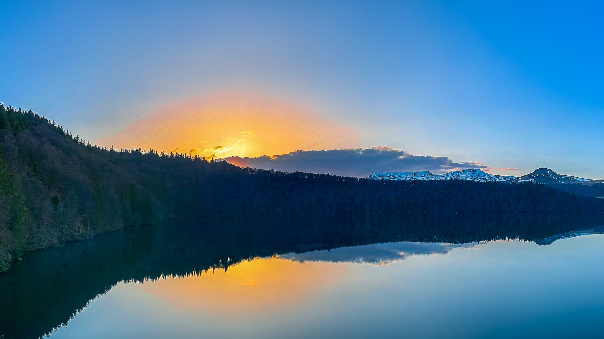 Massif du Sancy, peaceful Lac Pavin at sunset