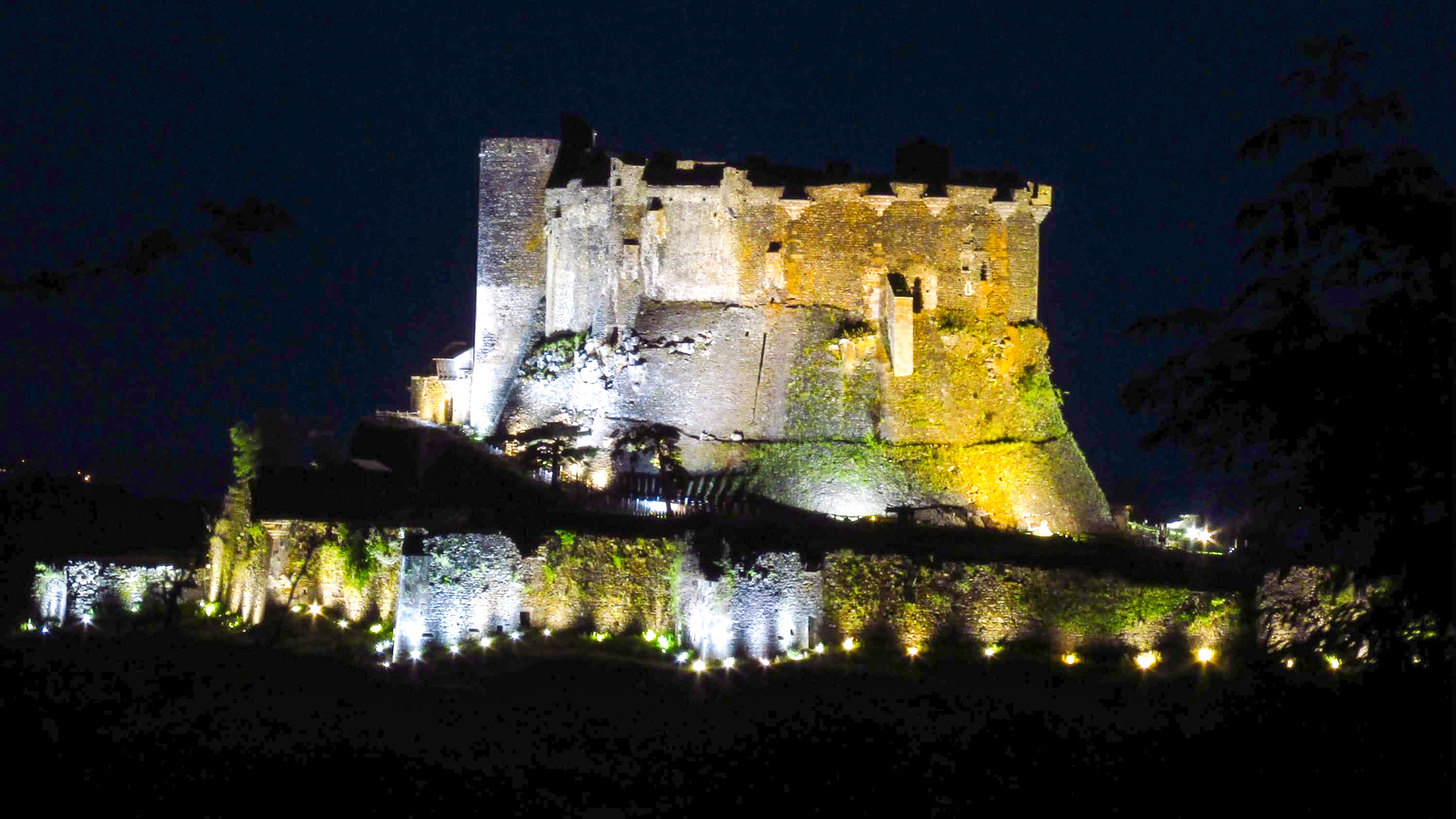 The Chateau de Murol illuminated at night