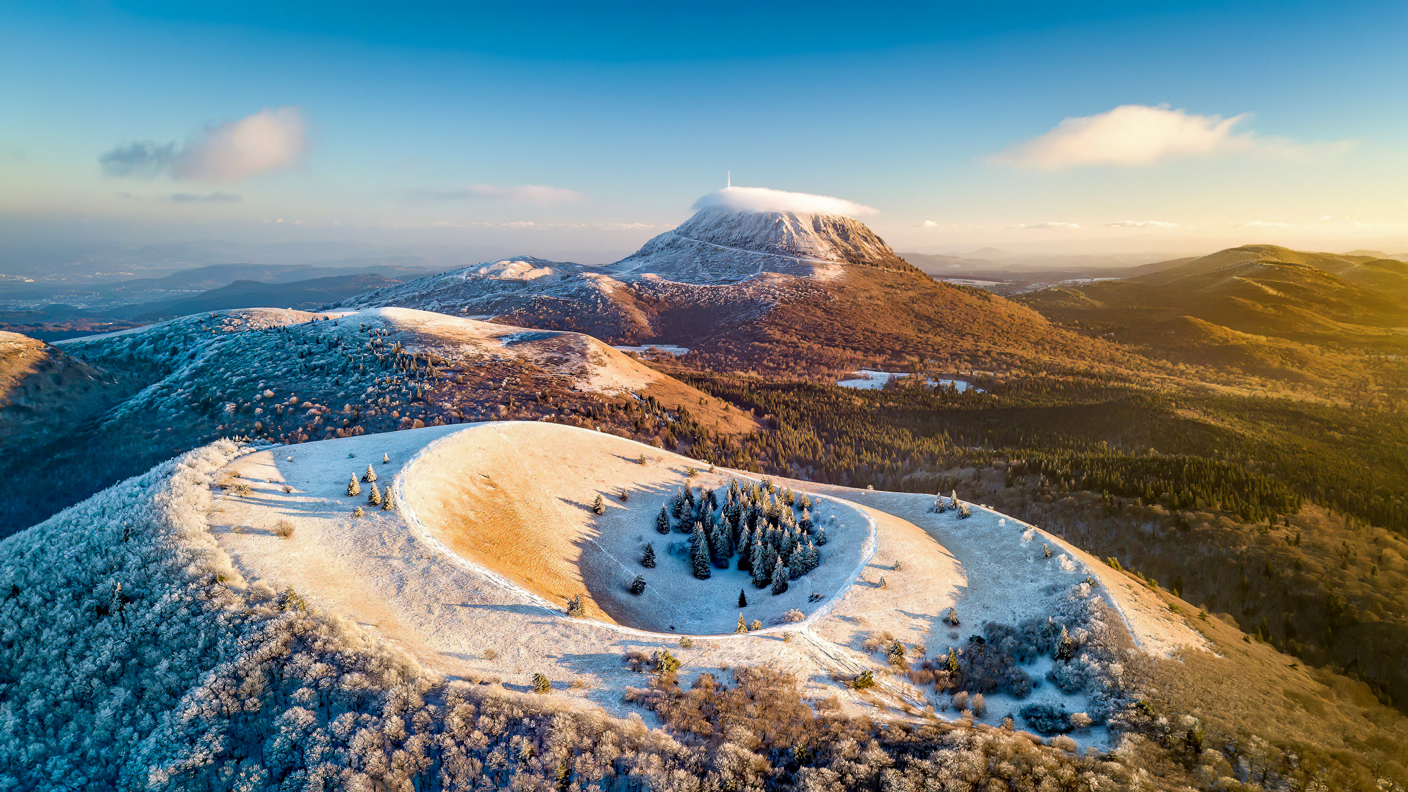 Puy de Dôme and Puy Pariou covered in snow